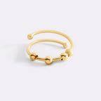 Moderner drehbarer Ring mit Perlen