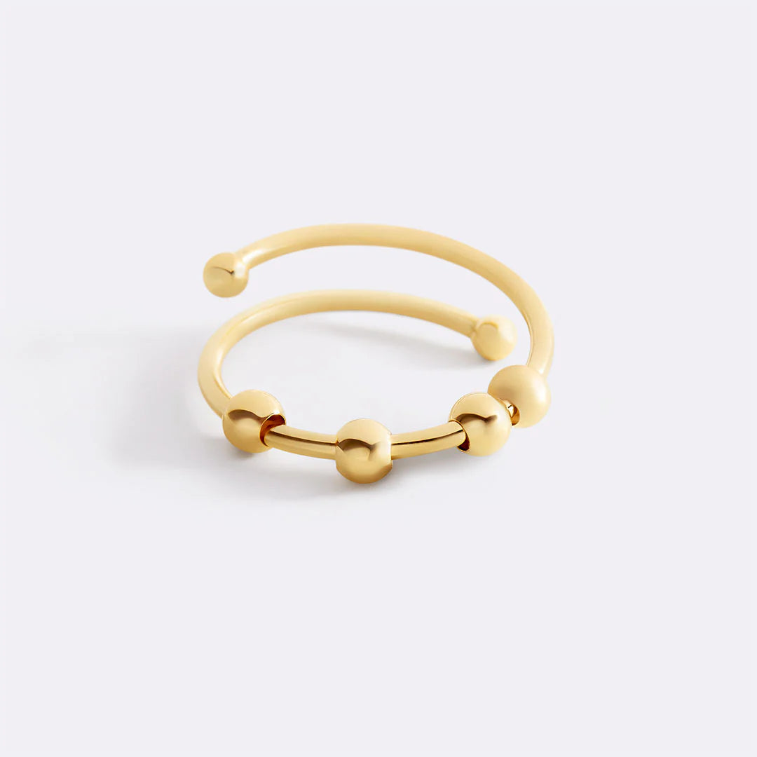Moderner drehbarer Ring mit Perlen