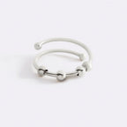 Moderner drehbarer Ring mit Perlen