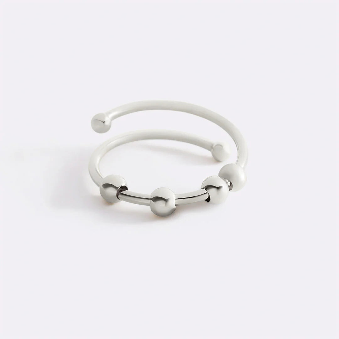 Moderner drehbarer Ring mit Perlen